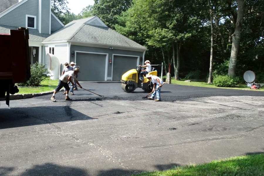 Beausoleil & Sons Paving & Asphalt Services - Paver Going Over Road - Driveway Paving - Sidewalk Paving - Paving Experts In My Area - Paving Solutions - team paving