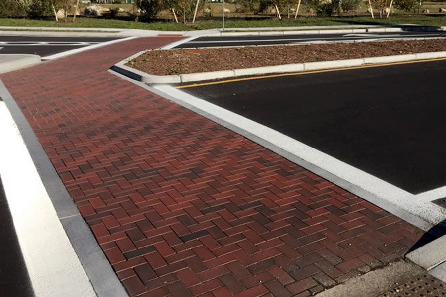 Beausoleil & Sons Paving & Asphalt Services - Paver Going Over Road - Driveway Paving - Sidewalk Paving - Paving Experts In My Area - Paving Solutions - nice paved crosswalk