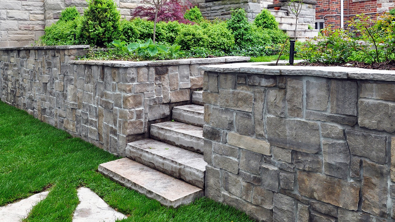 Beautiful Stone Wall & Staircase for home |Stone Wall Construction - Stone Wall Landscaping - Stone wall landscaper - Aspahlt Paving -Beausoleil & Sons Asphalt Experts